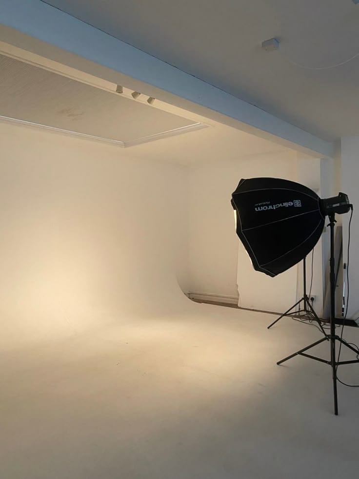 a photo studio with a light on the floor burlington nc